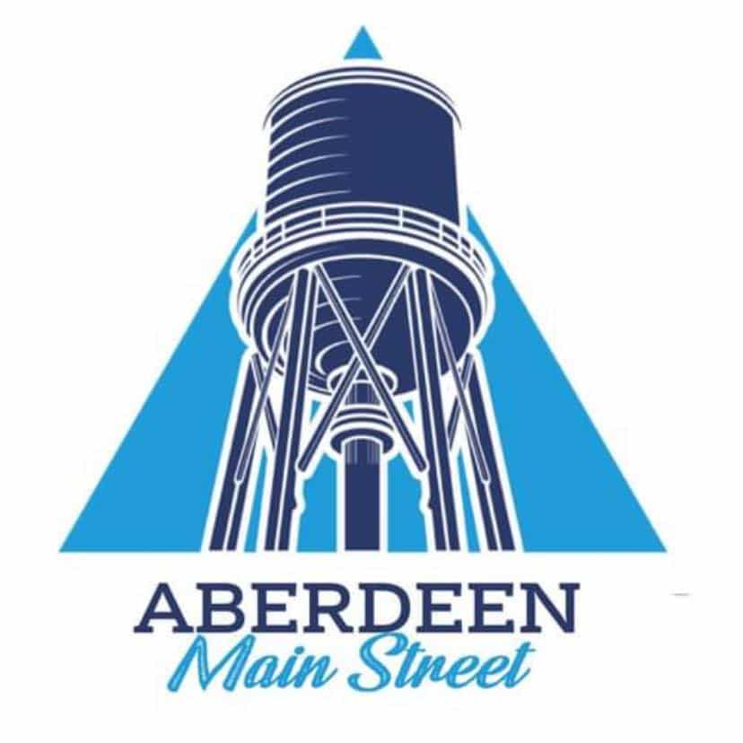 Aberdeen Mississippi Main Street and famous clock at Sunset